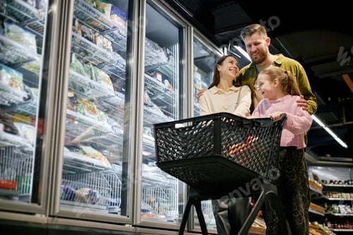 Preview: Shopping in Supermarket with Family of Three