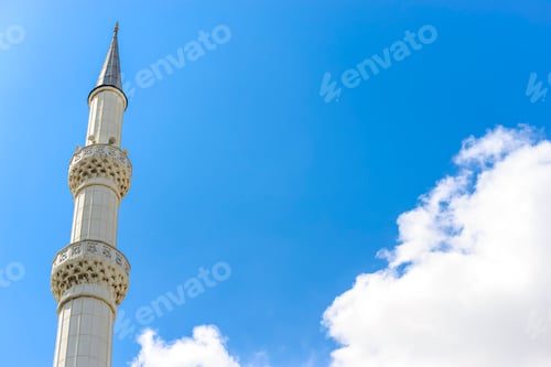 Preview: The minaret on a background of blue sky. Close up.