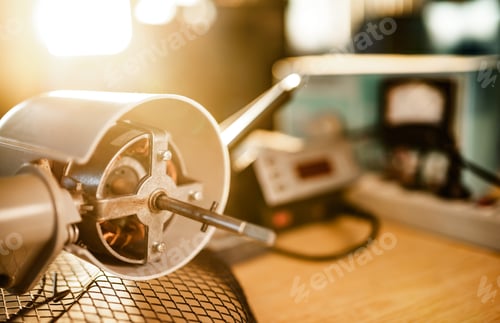 Preview: Close-up of iron motor from home cooling fan lies on a table