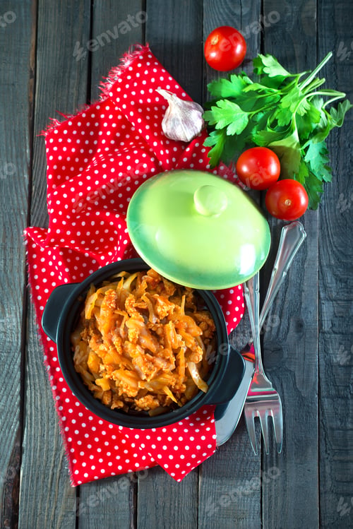 Preview: fried cabbage in bowl and on a table