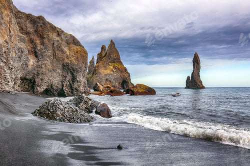 Preview: landscape with basalt rock formations Troll Toes on Black beach Reynisfjara near the village of Vik