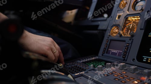 Preview: Panel of switches on an aircraft flight deck. Autopilot control element of an airliner. Pilot