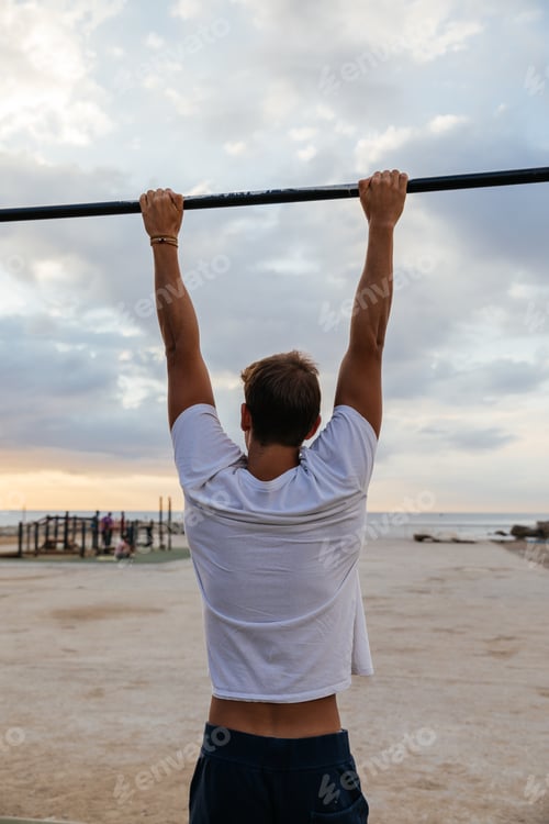 Preview: A male athlete training outdoors.