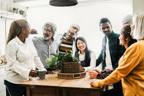 Preview: Happy group of people have fun drinking coffee together