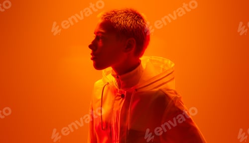 Preview: Woman in futuristic clothes in neon studio