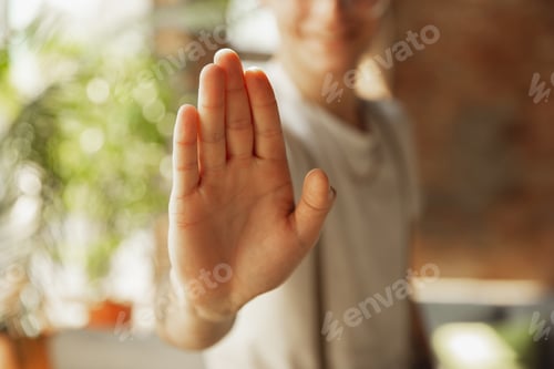Preview: Close up of male hand showing sign of stoping, rejectioning