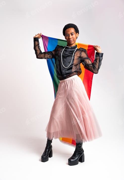 Preview: Fashionable fluid gender man posing in studio