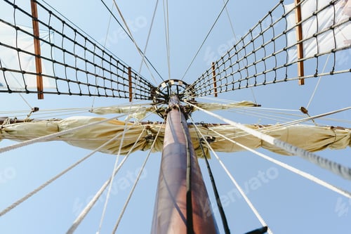 Preview: Mainmast and rope ladders to hold the sails of a sailboat.