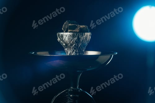 Preview: hookah bowl with coals with blue illumination on black