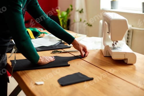 Preview: Step by step, woman dressmaker female measuring sewing pattern On Table