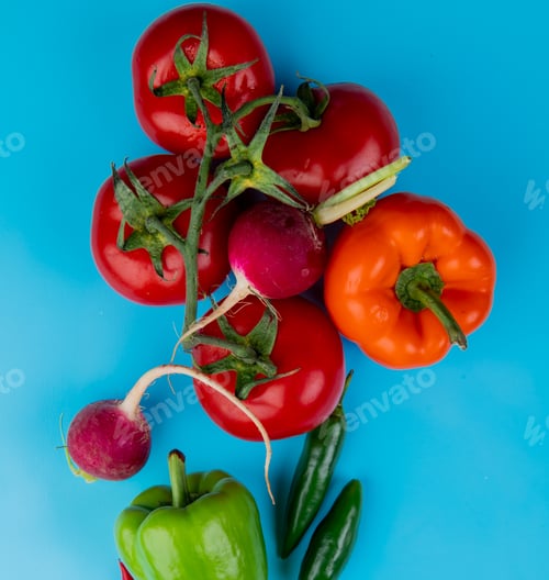 Preview: top view of fresh vegetables ripe tomatoes colorful bell peppers green chili peppers and radish