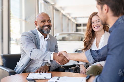 Preview: Couple buying new car at car dealership