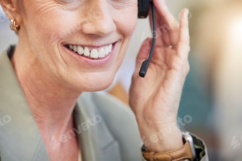 Preview: A bright smile can make a huge difference. Shot of a mature businesswoman working in a call center.