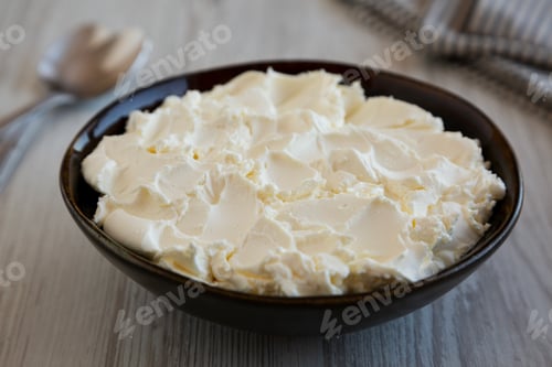 Preview: Organic White Mascarpone Cheese in a Bowl, side view.
