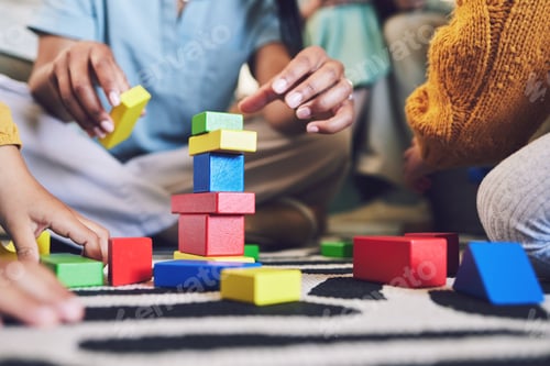 Preview: Hands, building blocks and color, learning and development with people at home playing games with t