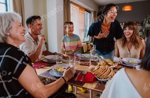 Preview: Family and friends reunion at home. Happy multigenerational family enjoying meal together at home