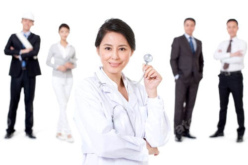 Preview: Professional female doctor with different occupation workers in background