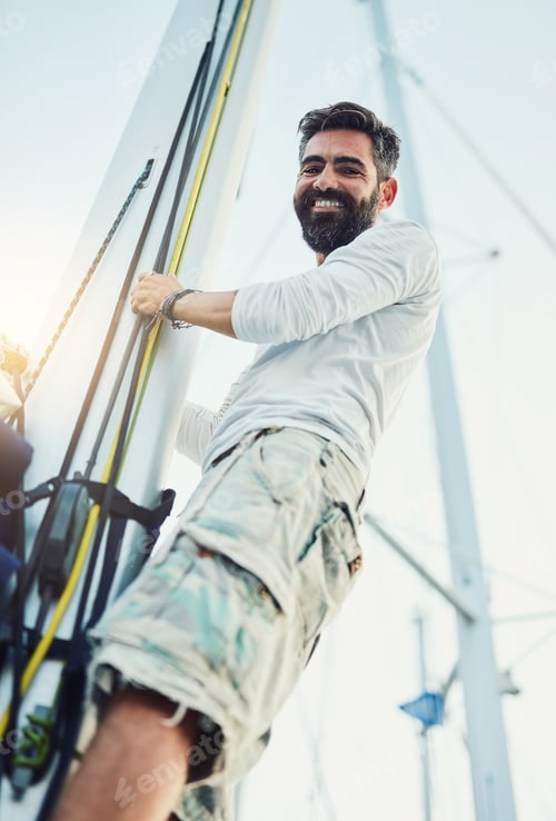 Preview: Are you up for a cruise. Cropped shot of a handsome mature man on his yacht.