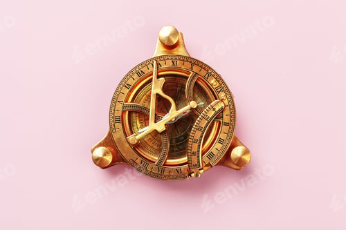 Preview: Compass on pink background, top view. Close up