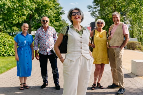 Preview: Group of senior friends meeting outddors in the city and having fun