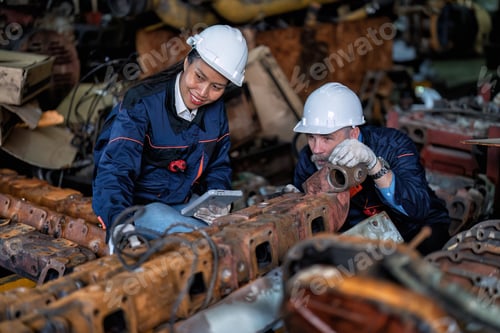 Preview: Maintenance manager and engineer checking part large engine supercharger prepare for overhaul repair