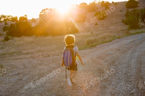 Preview: 4 year old boy hiking at sunset, Lamy, NM