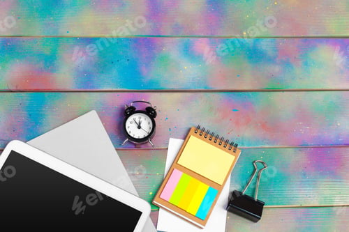 Preview: Modern blank digital tablet with papers and pen on a wooden desk. Top view. High quality