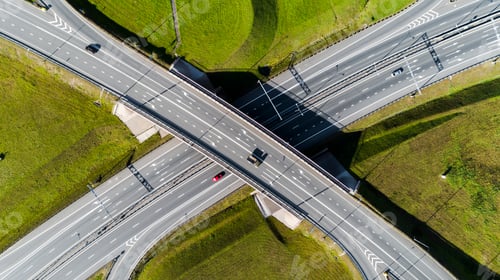Preview: Aerial view of highway interchange Road junction Aerial photo of a highway going through the forest