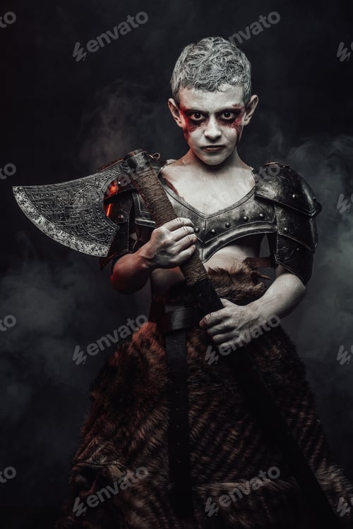 Preview: Serious boy barbarian with axe posing in dark background