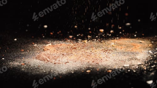 Preview: Close up view of crashed beige face powder on black background