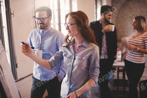 Preview: Group of creative designers and office coworkers working on project