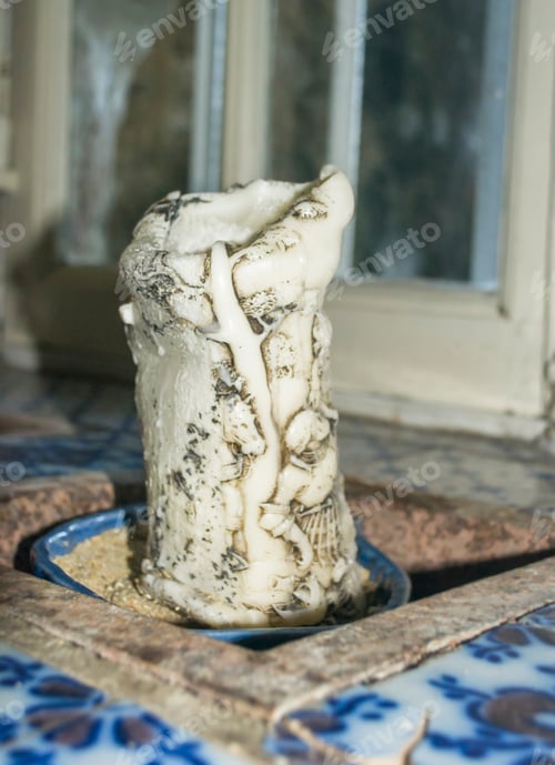 Preview: Old vintage carved candle with figures