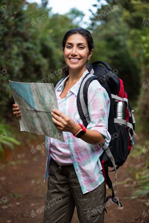 Preview: Woman Hiking Through A Forest In The Countryside