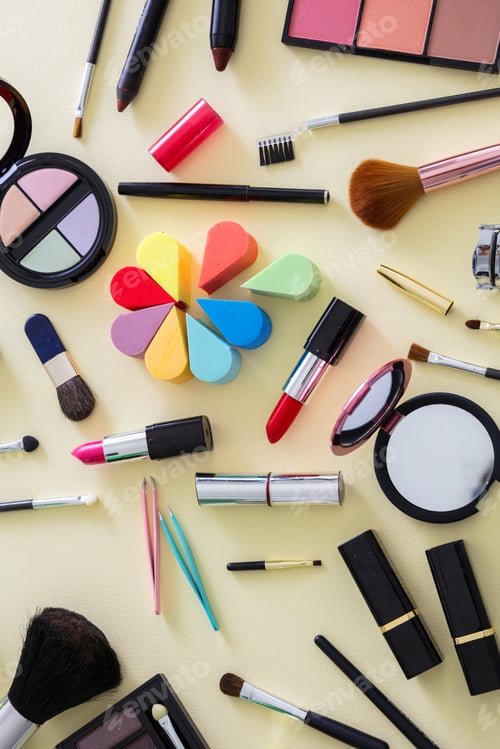 Preview: Make up cosmetics products against yellow color background