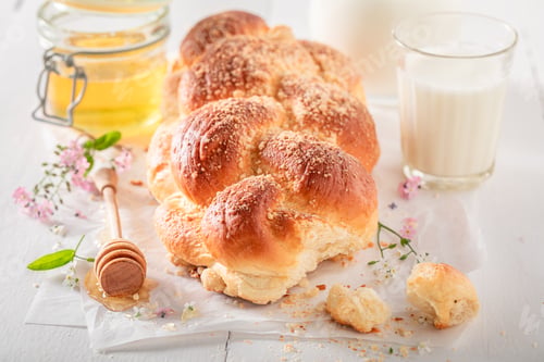 Preview: Delicious and fresh golden challah baked in a home bakery.