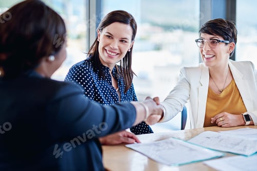 Preview: Cropped shot of corporate businesspeople meeting in the boardroom