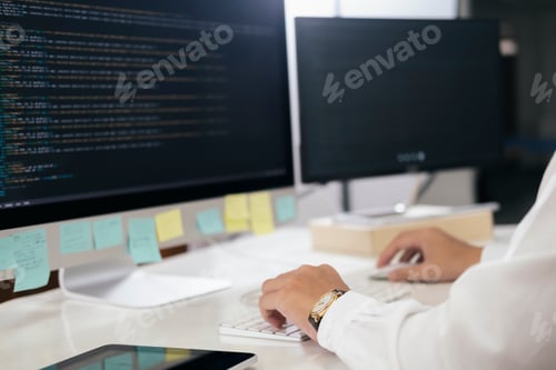 Preview: Programmer is coding and programming software