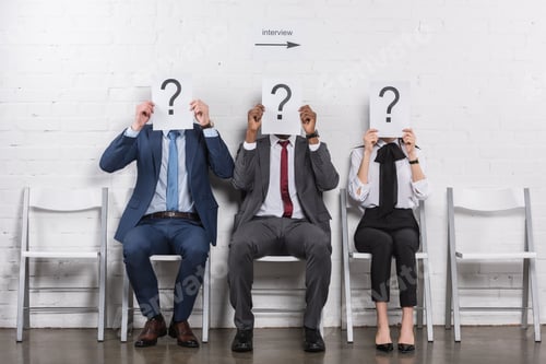 Preview: obscured view of multicultural business people holding cards with question marks while waiting for