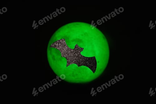 Preview: Glitter paper bat across the Moon Halloween background