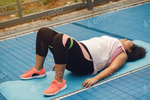Preview: Over the size of a woman doing stretching exercises