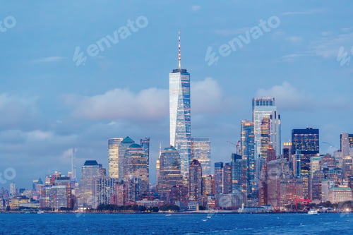 Preview: A vibrant sunset panorama of Manhattan downtown skyline, viewed from the river