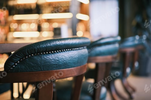 Preview: Close-up on bar green chairs at the bar. Close-up selective focus.