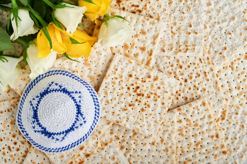 Preview: Passover celebration concept. Matzah, red kosher, white and yellow roses and walnut. Traditional rit