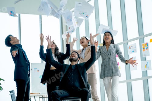 Preview: Asian business man and woman throw several paper up over the manager sit on chair and also happy