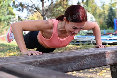 Preview: An athlete in comfortable sportswear. Outdoor fitness in the city. Healthy lifestyle. Coach exercise