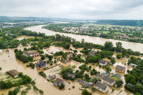 Preview: Aerial view of flooded houses with dirty water of Dnister river in Halych town, western Ukraine.