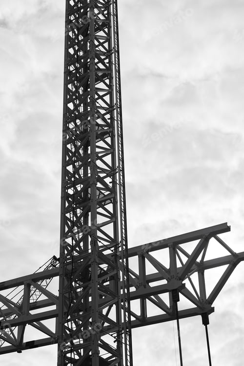 Preview: Huge cranes in black and white. Construction industry