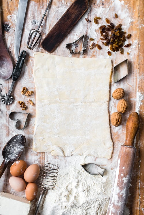Preview: The process of cooking, wooden background, top view