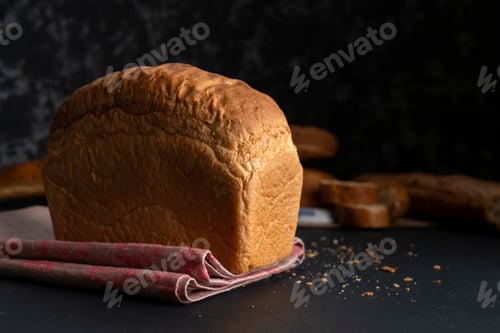 Preview: fresh hot loaf of white bread at the kitchen, cooking healthy breakfast at the kitchens