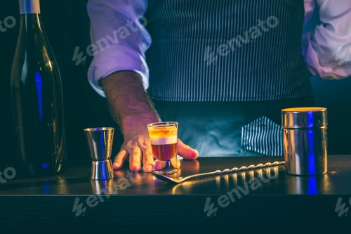 Preview: Barman serving B 52 cocktail